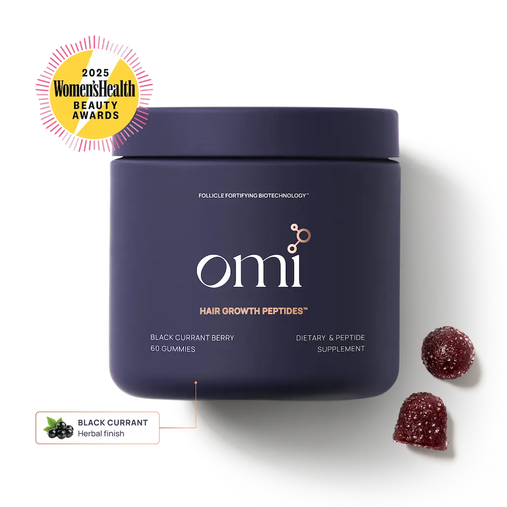 omi hair growth peptides container with black currant gummies on a white background