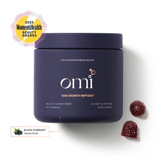omi hair growth peptides container with black currant gummies on a white background
