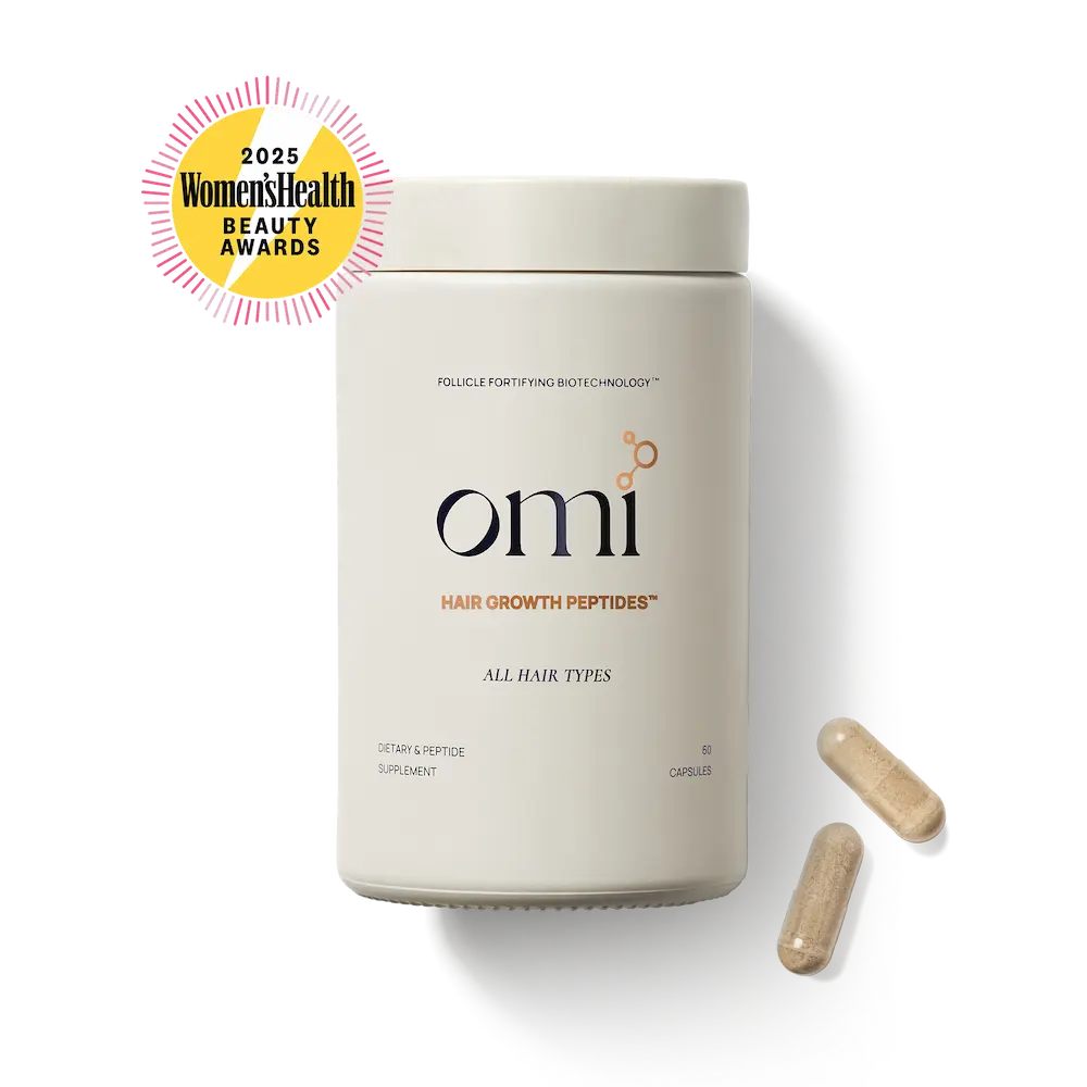 OMI Hair Growth Peptides Capsules – Follicle Fortifying Biotechnology™. Suitable for all hair types. Dietary & Peptide Supplement, 60 capsules. Cream-coloured jar with two loose capsules alongside. Winner of the 2025 Women's Health Beauty Awards.