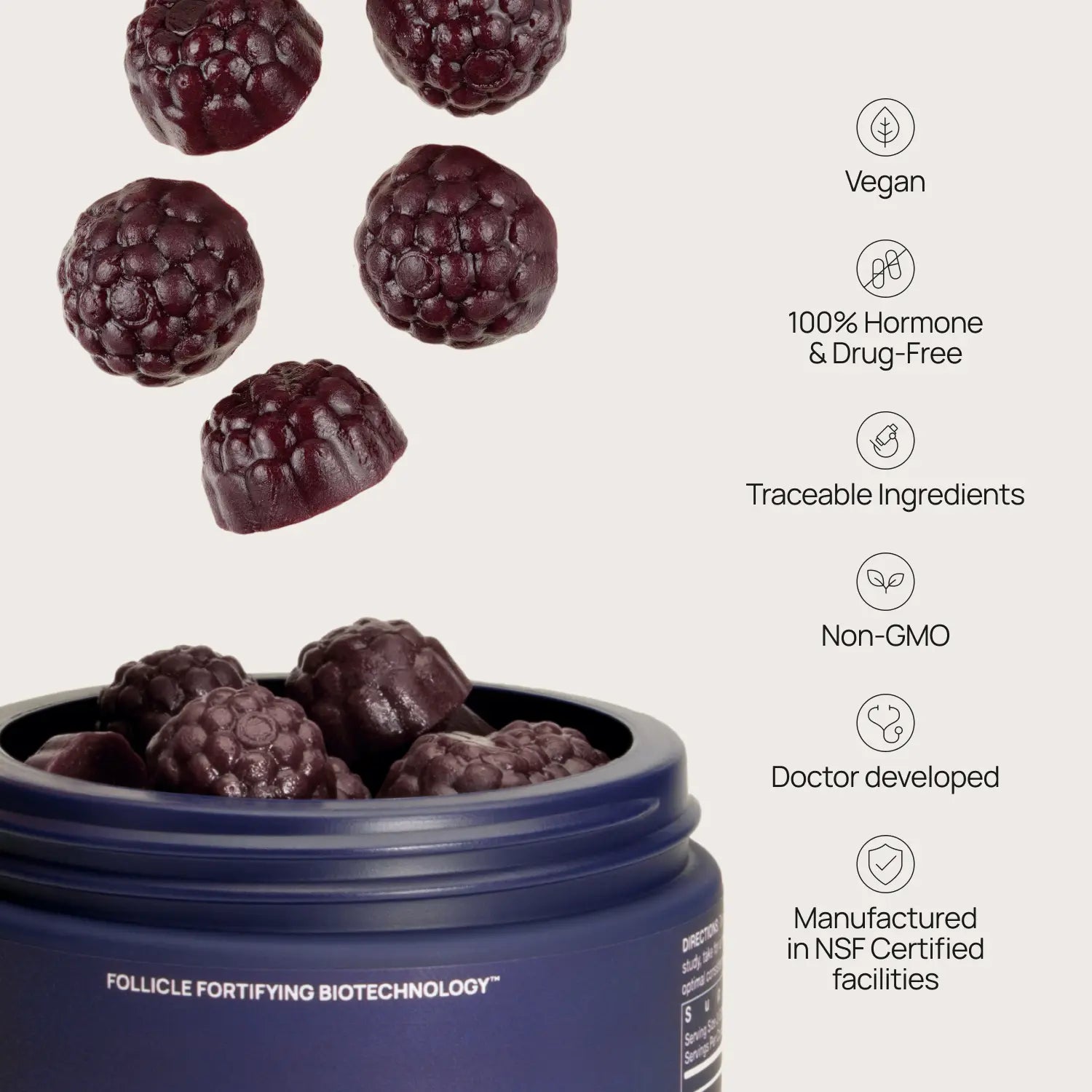 Blue container with purple berries and certification icons on a light gray background
