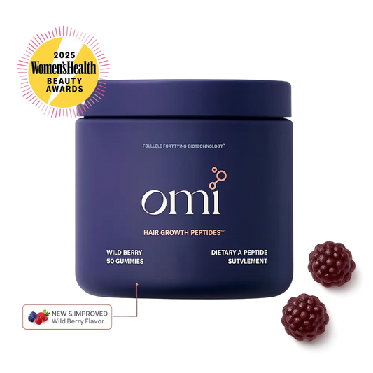Blue container of omi hair growth peptides with wild berry flavor on a white background, featuring the 2025 Women's Health Beauty Awards logo. Gummies.